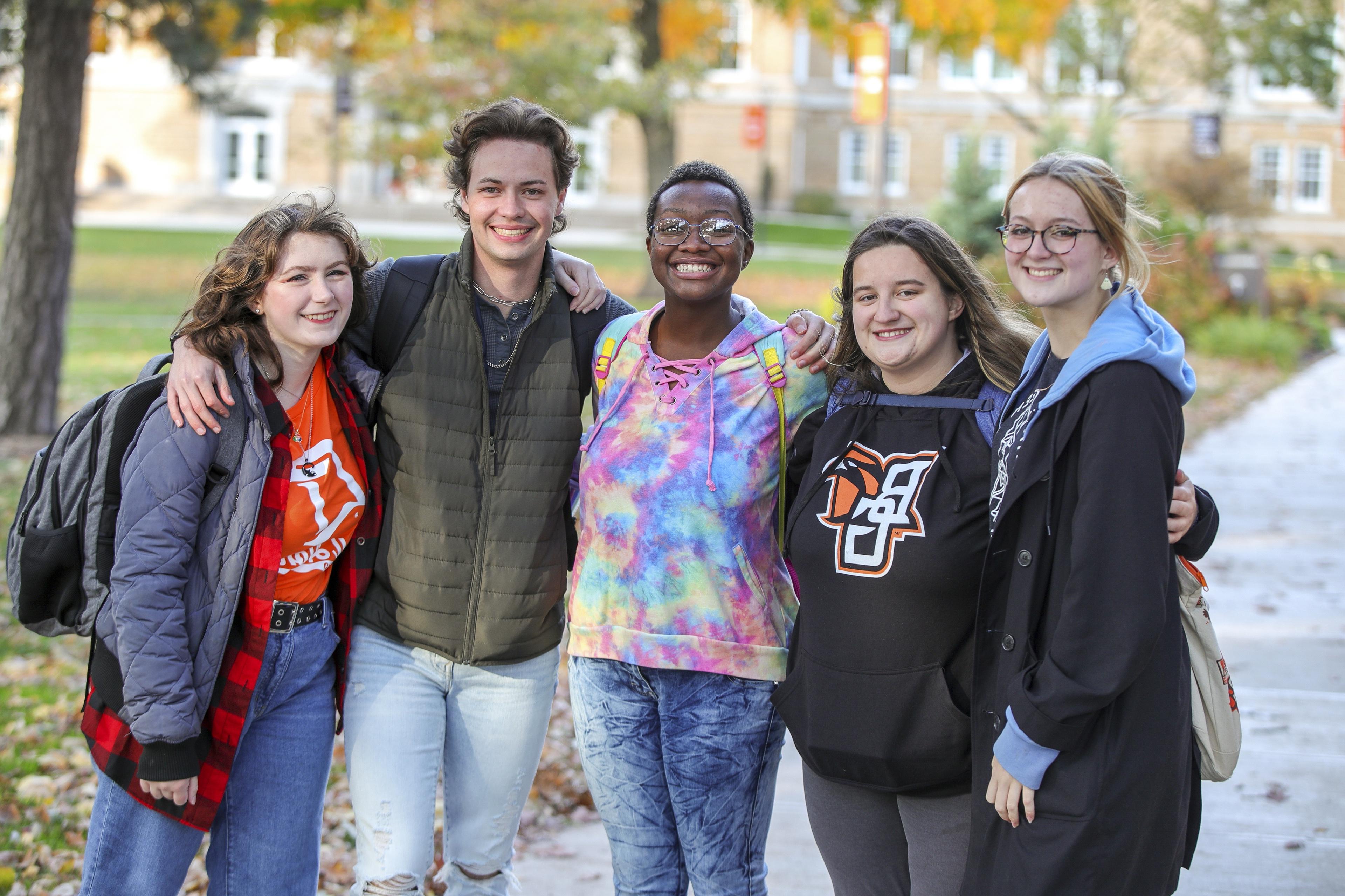Group of BGSU students with their arms around each other